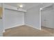 Bedroom featuring neutral carpet and a view of the closet and a doorway at 8000 Badura Ave # 2174, Las Vegas, NV 89113