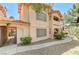 Exterior view of a two-story building with walkway and patio at 8450 Alta Dr # 204, Las Vegas, NV 89145