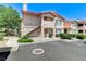 Charming two-story condo building featuring well-maintained landscaping and stairs to upper units at 8450 Alta Dr # 204, Las Vegas, NV 89145