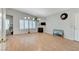 Bright living room offers ample space with wood floors, fireplace, and natural light at 8450 Alta Dr # 204, Las Vegas, NV 89145