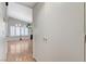 Partial view of a living room, captured from an interior hallway at 8450 Alta Dr # 204, Las Vegas, NV 89145