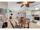 Bright living room showcasing an open floorplan, laminate floors, and cozy fireplace at 8450 Alta Dr # 204, Las Vegas, NV 89145