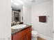 Bathroom featuring modern vanity, sink, toilet, and shower in a clean and bright space at 9050 W Tropicana Ave # 1170, Las Vegas, NV 89147