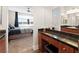 Open Primary bath with a vanity and make up station, offering scenic views from the attached bedroom at 9050 W Tropicana Ave # 1170, Las Vegas, NV 89147
