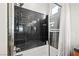 Modern bath and shower combination featuring granite-look tile and neutral accents at 9050 W Tropicana Ave # 1170, Las Vegas, NV 89147