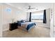 Bright bedroom features scenic outdoor views and a neutral color palette with accent furniture at 9050 W Tropicana Ave # 1170, Las Vegas, NV 89147