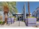 Building entrance featuring modern design, steps, and landscaping at 9050 W Tropicana Ave # 1170, Las Vegas, NV 89147