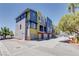 Modern building exterior with colorful accents and garage doors at 9050 W Tropicana Ave # 1170, Las Vegas, NV 89147