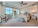 Light and bright bedroom features ceiling fan, carpet and city views at 9103 Alta Drive Dr # 407, Las Vegas, NV 89145