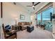 Comfortable living room with floor to ceiling glass and a beautiful view at 9103 Alta Drive Dr # 407, Las Vegas, NV 89145