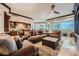 Inviting living room with plush sofas, custom built-ins, and expansive views from floor-to-ceiling windows at 9103 Alta Drive Dr # 407, Las Vegas, NV 89145