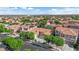 A beautiful shot of an expansive neighborhood of single Gathering homes with orange tile roofs at 9375 Gold Lake Ave, Las Vegas, NV 89149