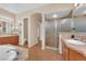 Bathroom featuring an oversized tub, separate shower and dual sink vanity at 9375 Gold Lake Ave, Las Vegas, NV 89149