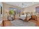 Comfortable bedroom featuring ample natural light and neutral tones for relaxation at 9375 Gold Lake Ave, Las Vegas, NV 89149