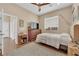 Inviting bedroom with wood furnishings, light walls, and a cozy, comfortable feel at 9375 Gold Lake Ave, Las Vegas, NV 89149