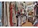 Organized walk-in closet with ample shelving and hanging space for clothes and storage at 9375 Gold Lake Ave, Las Vegas, NV 89149
