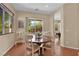 Dining room with tile floors, multiple windows, and view of the office at 9375 Gold Lake Ave, Las Vegas, NV 89149