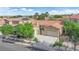 Charming single Gathering home with a two car garage, desert landscaping and a beautiful tile roof at 9375 Gold Lake Ave, Las Vegas, NV 89149