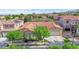 Well-manicured home featuring a tile roof, desert landscaping, and two car garage at 9375 Gold Lake Ave, Las Vegas, NV 89149