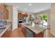 Kitchen with granite counters, stainless appliances, and backyard access at 9375 Gold Lake Ave, Las Vegas, NV 89149