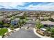 Expansive aerial view of the Teton community featuring single-Gathering homes and mountain views at 10024 Rams Leap Ave, Las Vegas, NV 89166