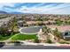Neighborhood aerial view featuring a playground, homes, and mountain views on a sunny day at 10024 Rams Leap Ave, Las Vegas, NV 89166