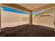 Gravel backyard space surrounded by tall block walls at 10024 Rams Leap Ave, Las Vegas, NV 89166