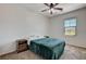 Cozy bedroom with natural light, simple decor and standard furnishings at 10024 Rams Leap Ave, Las Vegas, NV 89166