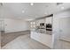 Bright kitchen with granite island offers eat-in dining with convenient access to other living spaces at 10024 Rams Leap Ave, Las Vegas, NV 89166