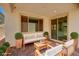 Cozy outdoor patio area with comfortable seating, perfect for relaxation at 10024 Rams Leap Ave, Las Vegas, NV 89166