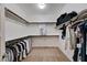 Spacious walk-in closet features ample hanging space and shelving for organized storage at 10024 Rams Leap Ave, Las Vegas, NV 89166