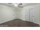 Bedroom featuring multiple closets, neutral walls and carpet flooring, with a ceiling fan at 10058 Saint Augustine St, Las Vegas, NV 89183