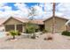 Charming one-story home with low-maintenance desert landscaping and a two-car garage at 10058 Saint Augustine St, Las Vegas, NV 89183