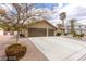 Charming one-story home with a spacious driveway and desert landscaping at 10058 Saint Augustine St, Las Vegas, NV 89183