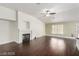 Bright living room features a modern fireplace, vaulted ceilings, and large windows that provide ample natural light at 10058 Saint Augustine St, Las Vegas, NV 89183