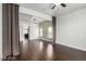 Spacious living room features dark floors, recessed lighting, and an open layout, ideal for entertaining and modern living at 10058 Saint Augustine St, Las Vegas, NV 89183