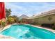 Inviting swimming pool with a spacious patio area and shade providing pergola at 10058 Saint Augustine St, Las Vegas, NV 89183