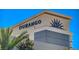 Durango Casino Resort signage against a blue sky, showcasing the modern architectural design of the building at 10228 Shell Star Ave, Las Vegas, NV 89135