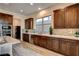 Well-appointed kitchen with ample cabinetry, stainless steel appliances, and a modern backsplash at 10228 Shell Star Ave, Las Vegas, NV 89135