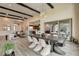 Open-concept living space with a view of the dining area and kitchen, perfect for entertaining and relaxation at 10228 Shell Star Ave, Las Vegas, NV 89135