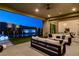Covered patio overlooking pool with water features, perfect for outdoor relaxation and entertaining at 10228 Shell Star Ave, Las Vegas, NV 89135