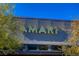 A close up view of the 'AMARI' signage on a modern building, showcasing its design and branding at 10228 Shell Star Ave, Las Vegas, NV 89135