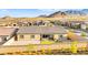 Beautiful backyard with patio seating and mountain views, ideal for outdoor entertaining at 10906 Mila Landing Ave, Las Vegas, NV 89166