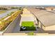Aerial shot showcasing a backyard with gravel, compact lawn area, and patio furniture perfect for outdoor entertaining at 10906 Mila Landing Ave, Las Vegas, NV 89166