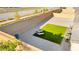 Private backyard featuring decorative rock, small lawn, patio, and string lights at 10906 Mila Landing Ave, Las Vegas, NV 89166