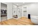 Bright bathroom featuring a glass enclosed shower, tub and a walk-in closet provides a spa-like experience at 10906 Mila Landing Ave, Las Vegas, NV 89166