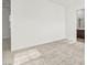 The neutral bedroom includes a doorway to an ensuite bathroom at 10906 Mila Landing Ave, Las Vegas, NV 89166