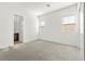 This bedroom features an ensuite bath and walk in closet at 10906 Mila Landing Ave, Las Vegas, NV 89166