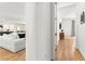 Bright hallway connects the main living spaces, offering a seamless flow throughout the home at 10906 Mila Landing Ave, Las Vegas, NV 89166