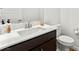 Simple powder room with vanity and toilet at 10906 Mila Landing Ave, Las Vegas, NV 89166